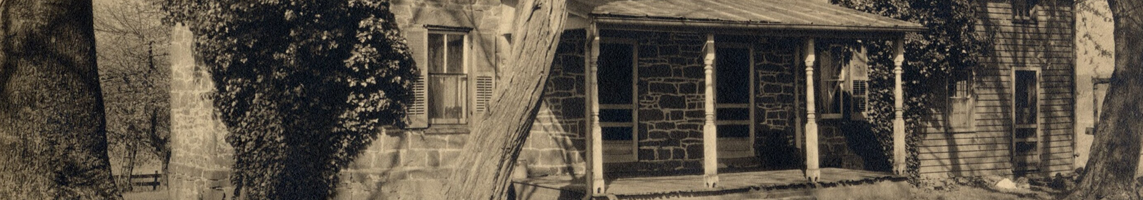 Detail from sepia-toned image of front porch of stone house
