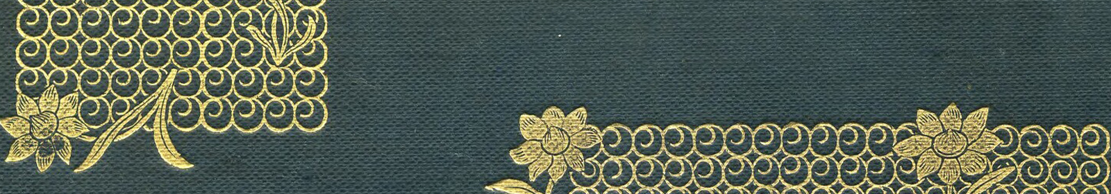 A gold floral design on a deep blue book cover
