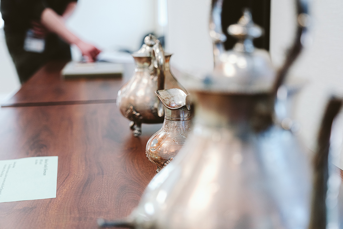 A collection of 19th-century silver flatware and tea service.