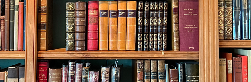 Shelves of books, primarily from the English portion of the Iselin Collection. 