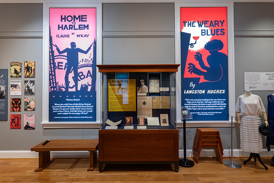 Main gallery exhibition space featuring works by Claude McKay and Langston Hughes